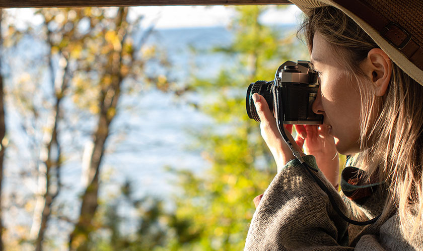 Woman taking photo of nature
