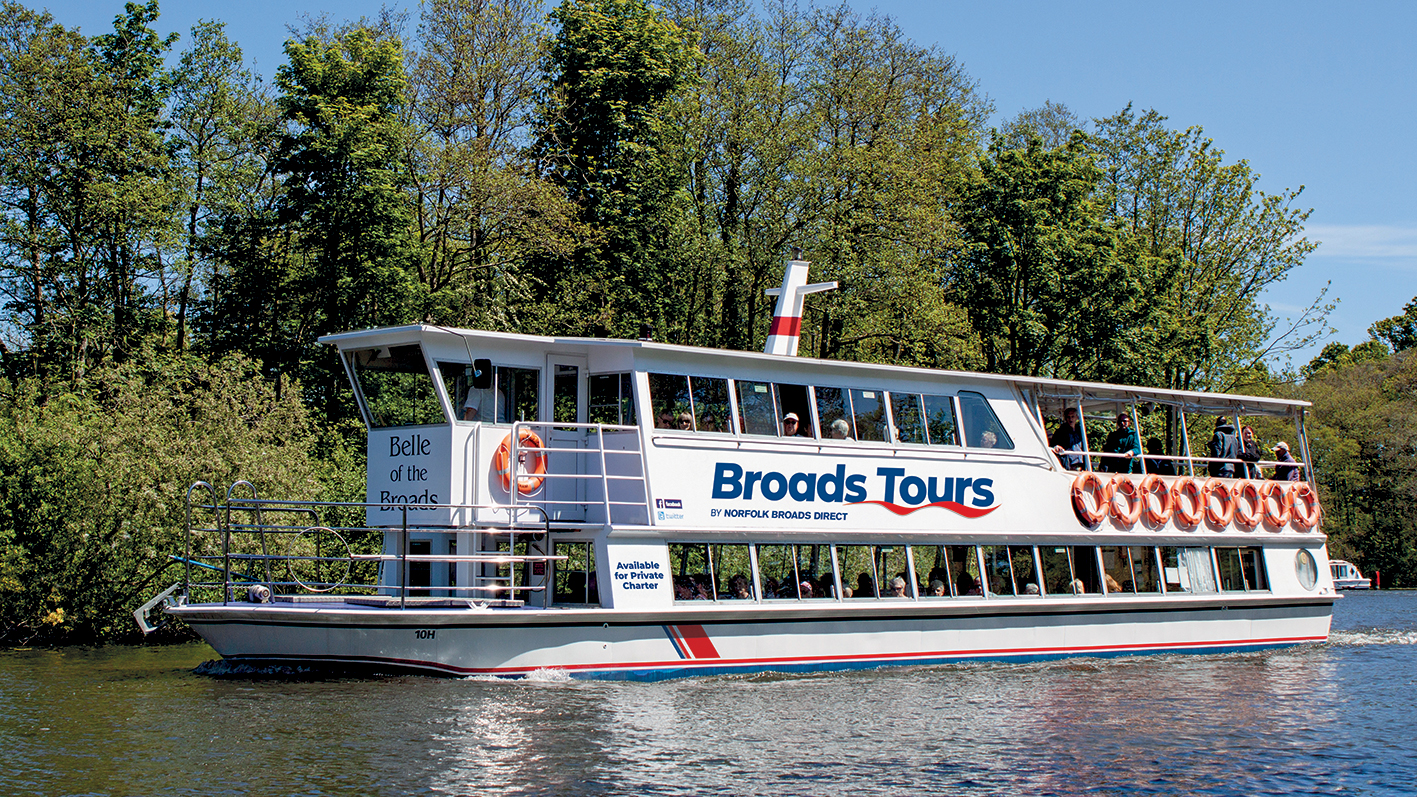 Queen of the Broads River Cruise Passenger boat sailing in the Broads national Park