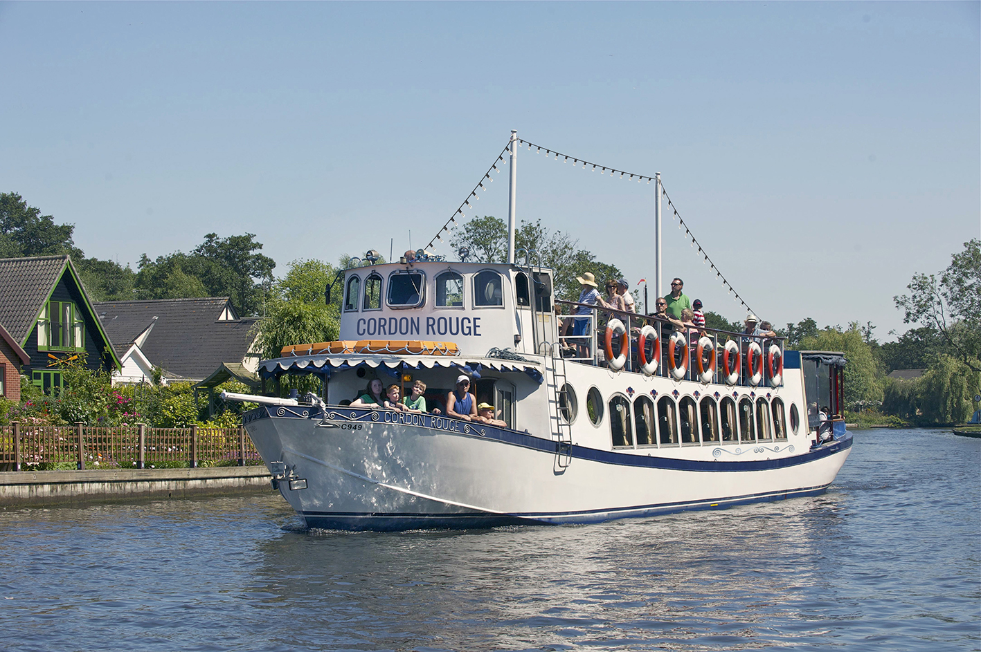 Cordon Rouge River Cruise Passenger boat sailing in the Broads national Park