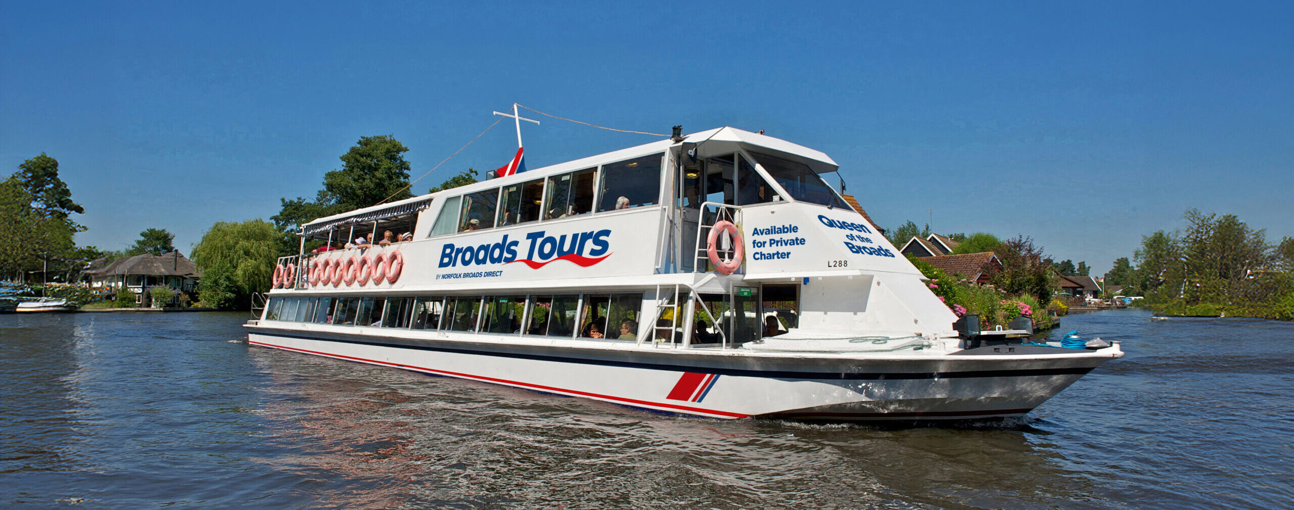 Queen of the Broads River Cruise Passenger boat sailing in the Broads national Park