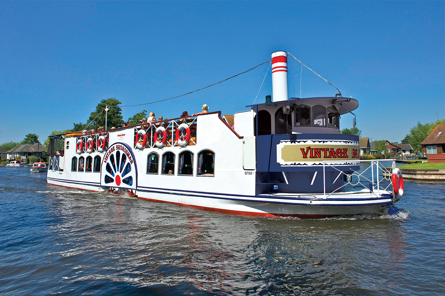 Vintage Broadsman River Cruise Passenger boat sailing in the Broads national Park